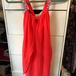 Pink and silver jeweled semi-formal dress.